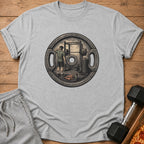 T-shirt with graphic of man at squat rack inside a weight plate.