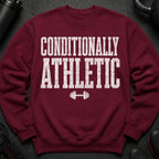 Maroon sweatshirt with white distressed text "CONDITIONALLY ATHLETIC" and barbell graphic.