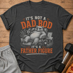 Bear relaxing in chair with drink, text "It's not a dad bod, it's a father figure."