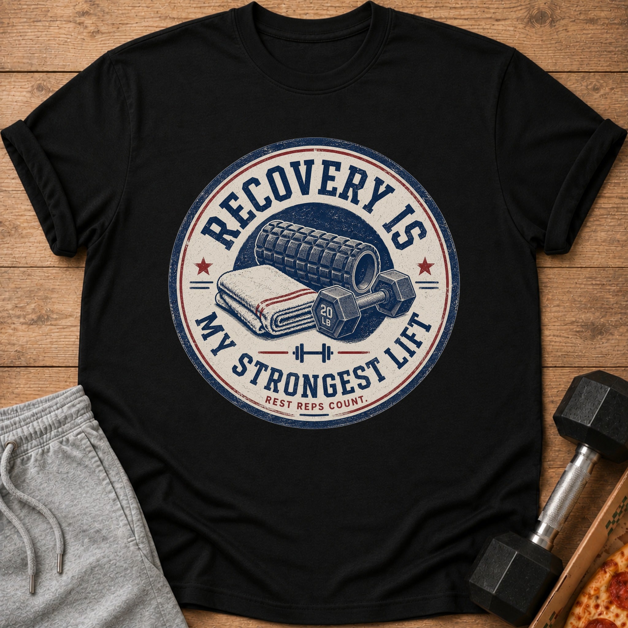 Black t-shirt with distressed graphic: "Recovery Is My Strongest Lift. Rest Reps Count."