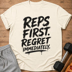 Cream t-shirt with black text: "REPS FIRST. REGRET IMMEDIATELY."