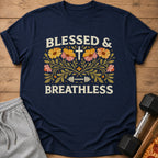 Navy t-shirt with "Blessed & Breathless" text, cross, and floral design.