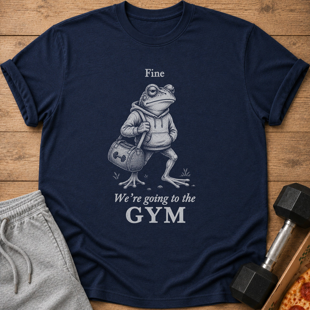 Navy t-shirt with a distressed graphic of a frog wearing a hoodie and carrying a gym bag, with text "Fine We're going to the GYM".