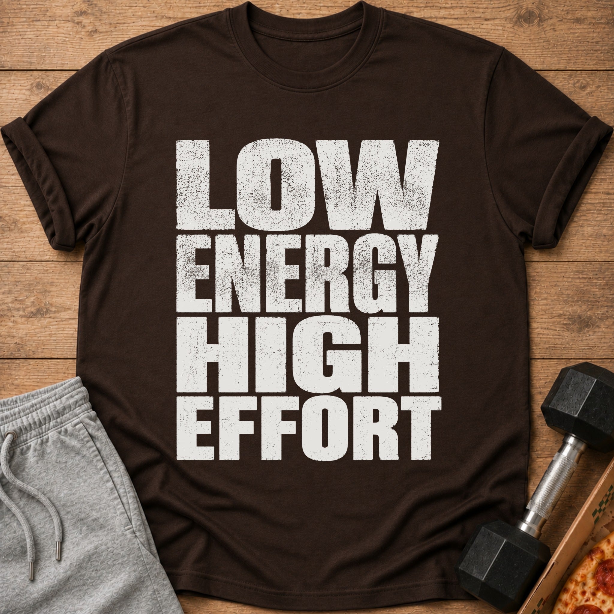 Brown t-shirt with distressed white text "LOW ENERGY HIGH EFFORT".