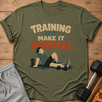Green t-shirt graphic with text "TRAINING BUT MAKE IT MINIMAL" and a cartoon man resting.