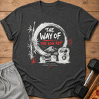 Dark t-shirt with "The Way of The Low Rep" text, bamboo, mountains, dumbbell, and kettlebell.