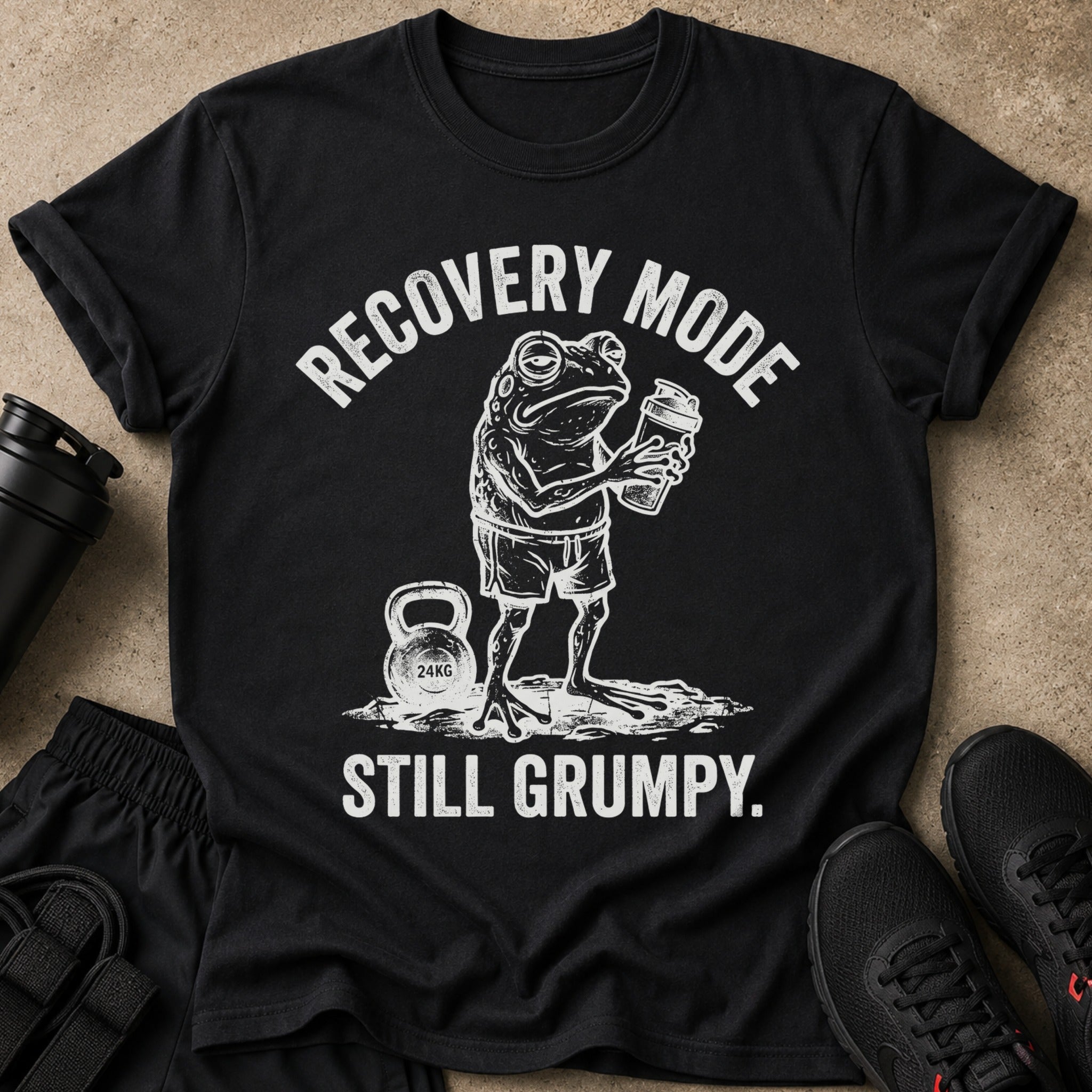 Black t-shirt with a frog holding a shaker and text "Recovery Mode Still Grumpy."