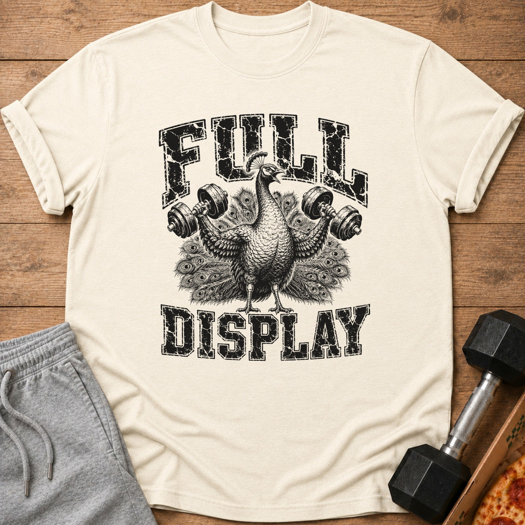 Peacock lifting weights with "FULL DISPLAY" text on a light-colored shirt.