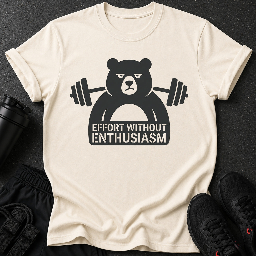 Cream t-shirt with a black graphic of a bear lifting weights and the text "Effort Without Enthusiasm".
