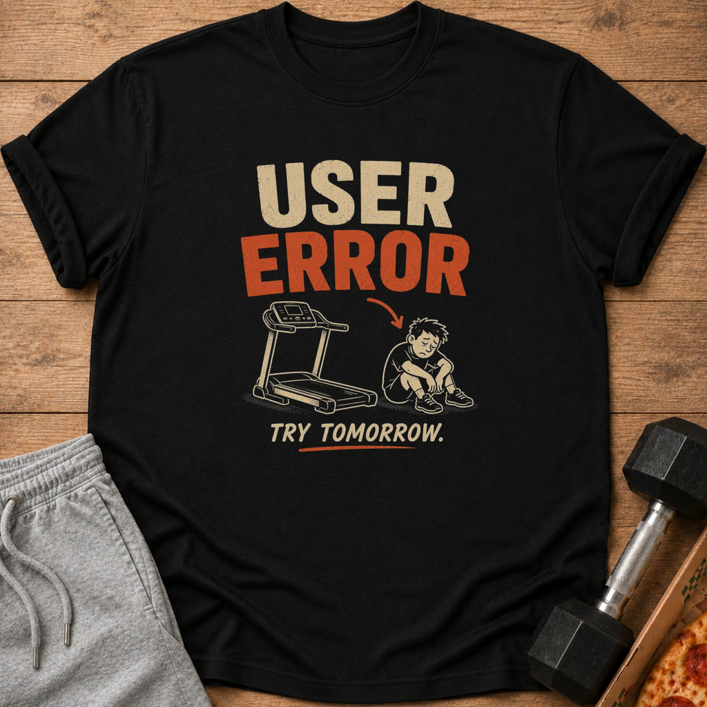 Black t-shirt with "USER ERROR" text, a sad figure by a treadmill, and "TRY TOMORROW."