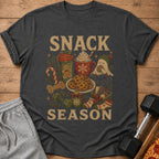 T-shirt with "SNACK SEASON" text and holiday-themed snacks and gym items.