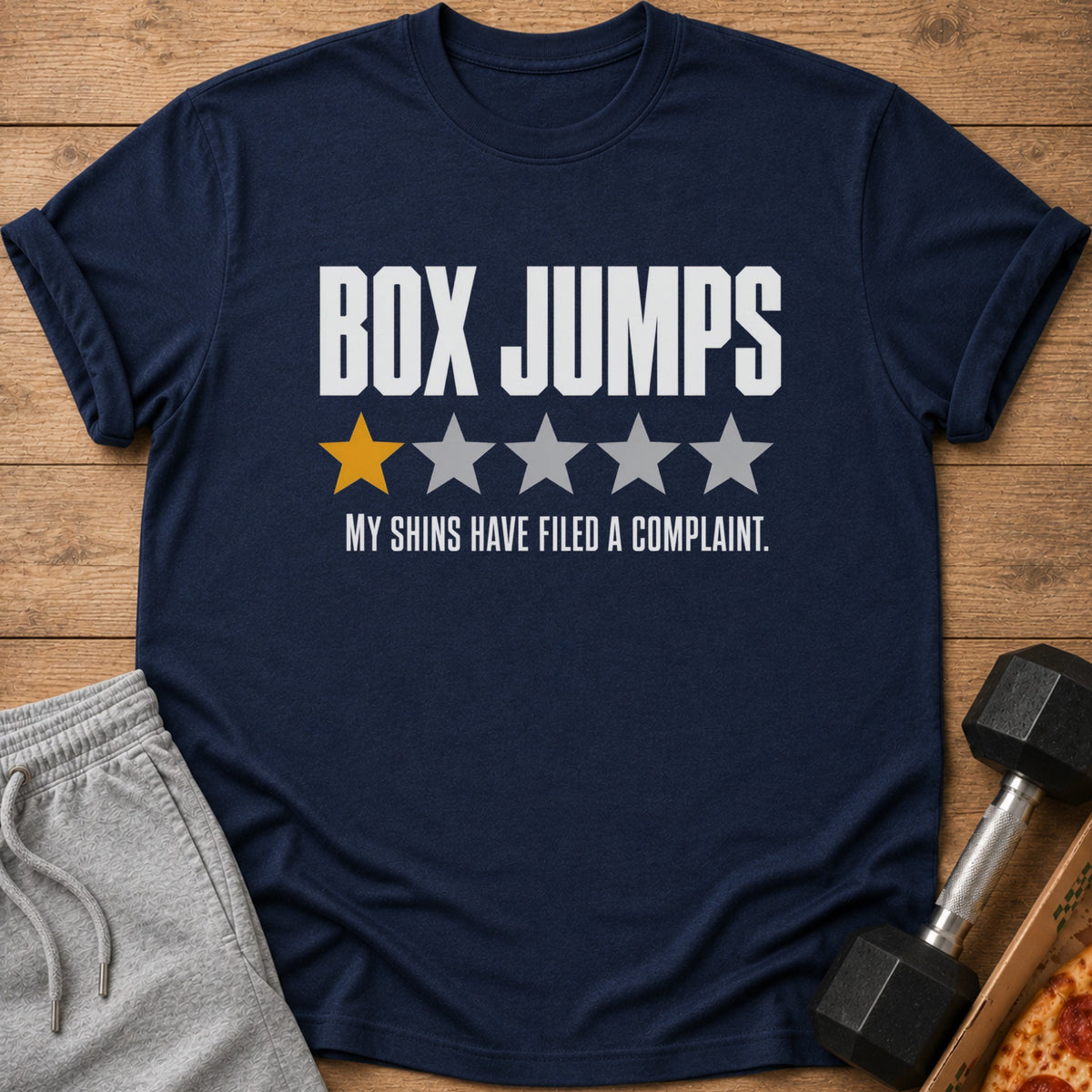 Navy t-shirt with "BOX JUMPS" text, one yellow star, and four gray stars.