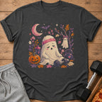 T-shirt with sleeping ghost, pumpkin, dumbbell, and moon graphic.