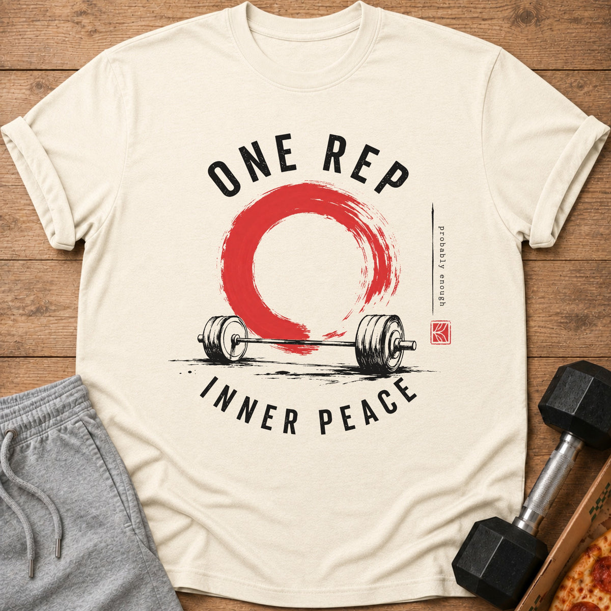 Cream t-shirt with "ONE REP INNER PEACE" text and barbell graphic.