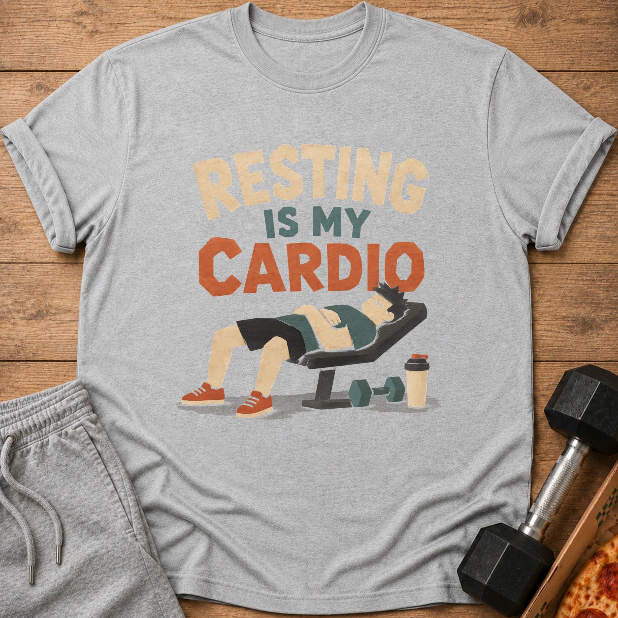 Grey t-shirt with "Resting Is My Cardio" text and a man on a weight bench.