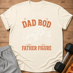 Cream t-shirt with "Dad Bod: It's not a father figure" text and a sloth graphic.