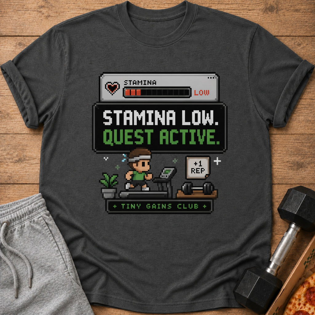 Dark grey t-shirt with pixel art: stamina low, quest active, +1 rep, tiny gains club.