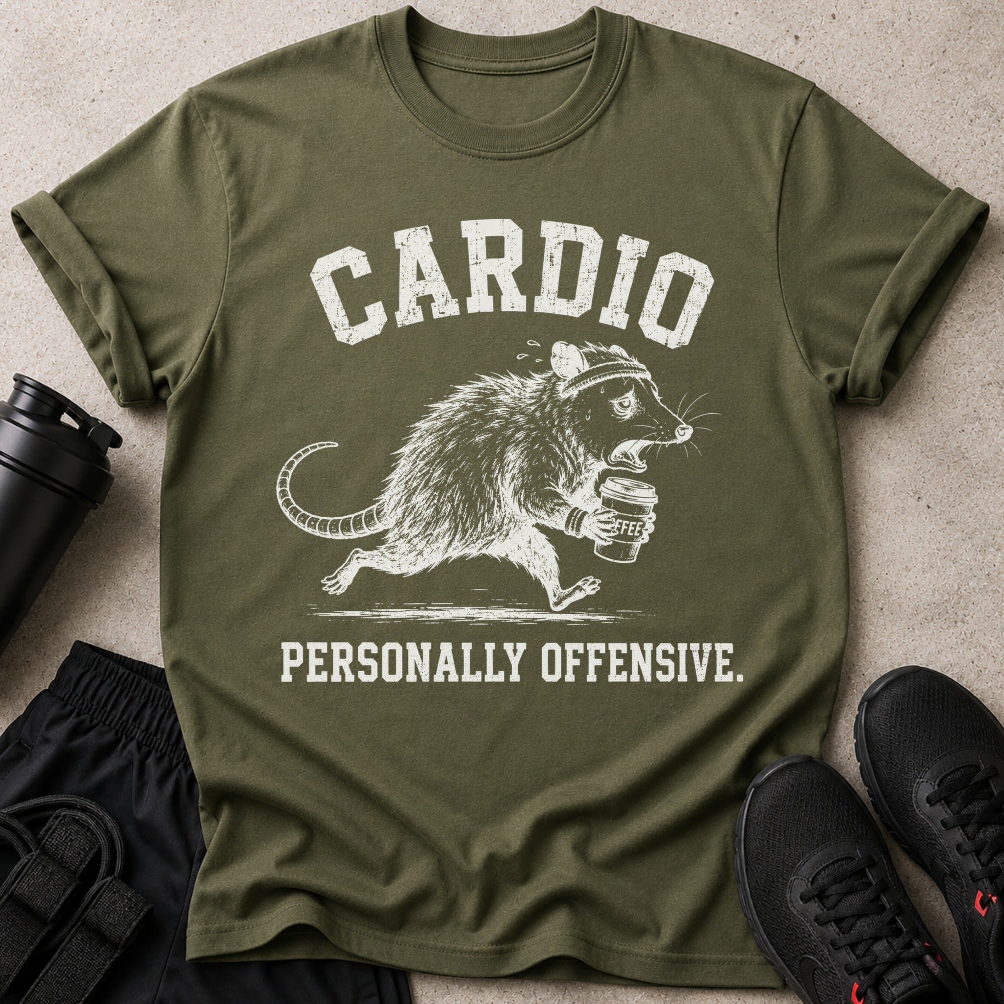 Olive t-shirt with white distressed text and illustration reading "CARDIO PERSONALLY OFFENSIVE."