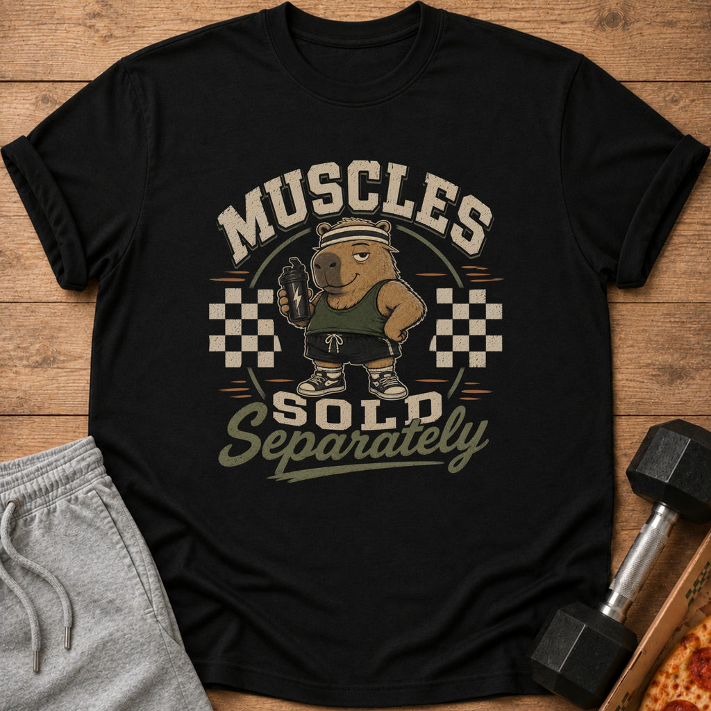 Black t-shirt with a cartoon capybara holding a shaker bottle and the text "MUSCLES SOLD Separately".