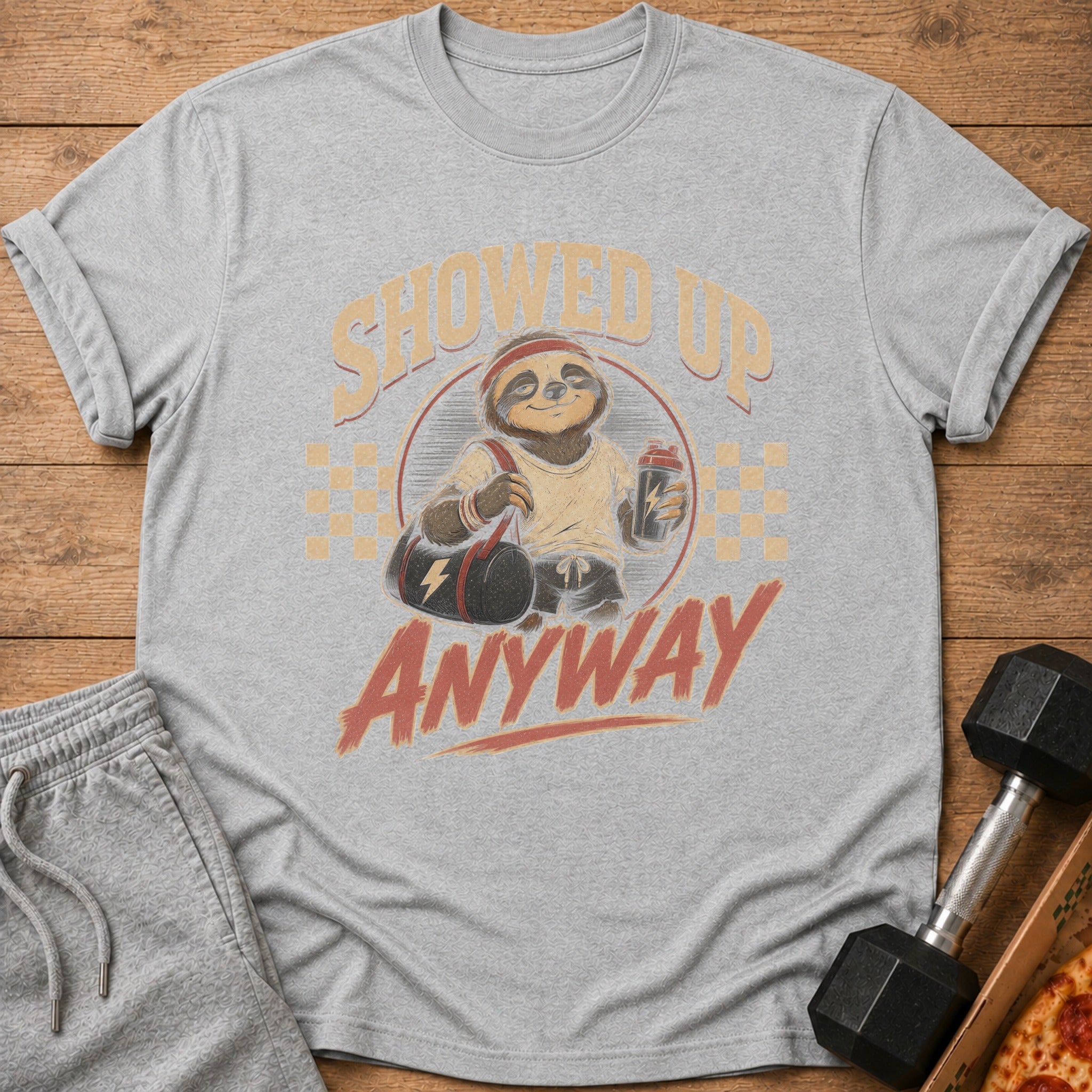 Gray t-shirt with a sloth wearing workout gear and text "SHOWED UP ANYWAY".