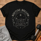 Black t-shirt with "Routine Hollow" graphic featuring a landscape and "No Glory Just Consistency" text.