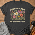 Dark gray t-shirt with "Overstimulated Moms Who Lift" text and floral dumbbell graphic.