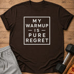 Brown t-shirt with white text "MY WARMUP IS PURE REGRET".