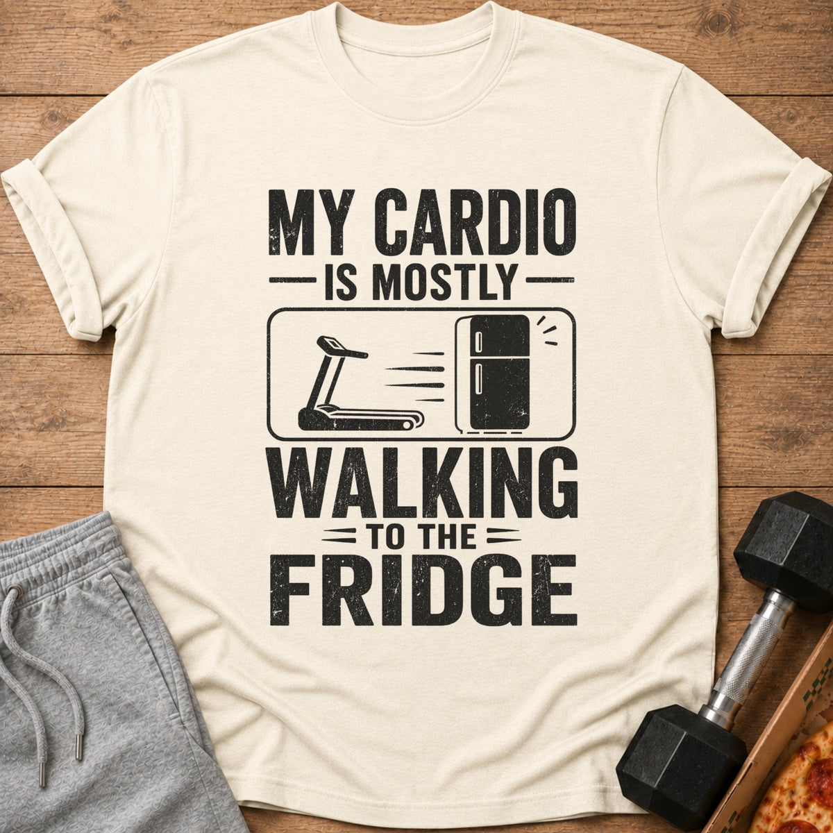 Cream t-shirt with text "My cardio is mostly walking to the fridge."