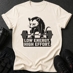 Opossum lifting barbell with text "LOW ENERGY. HIGH EFFORT."