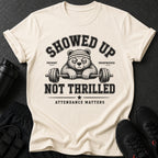 T-shirt with text "SHOWED UP NOT THRILLED ATTENDANCE MATTERS" and a bear lifting a barbell.