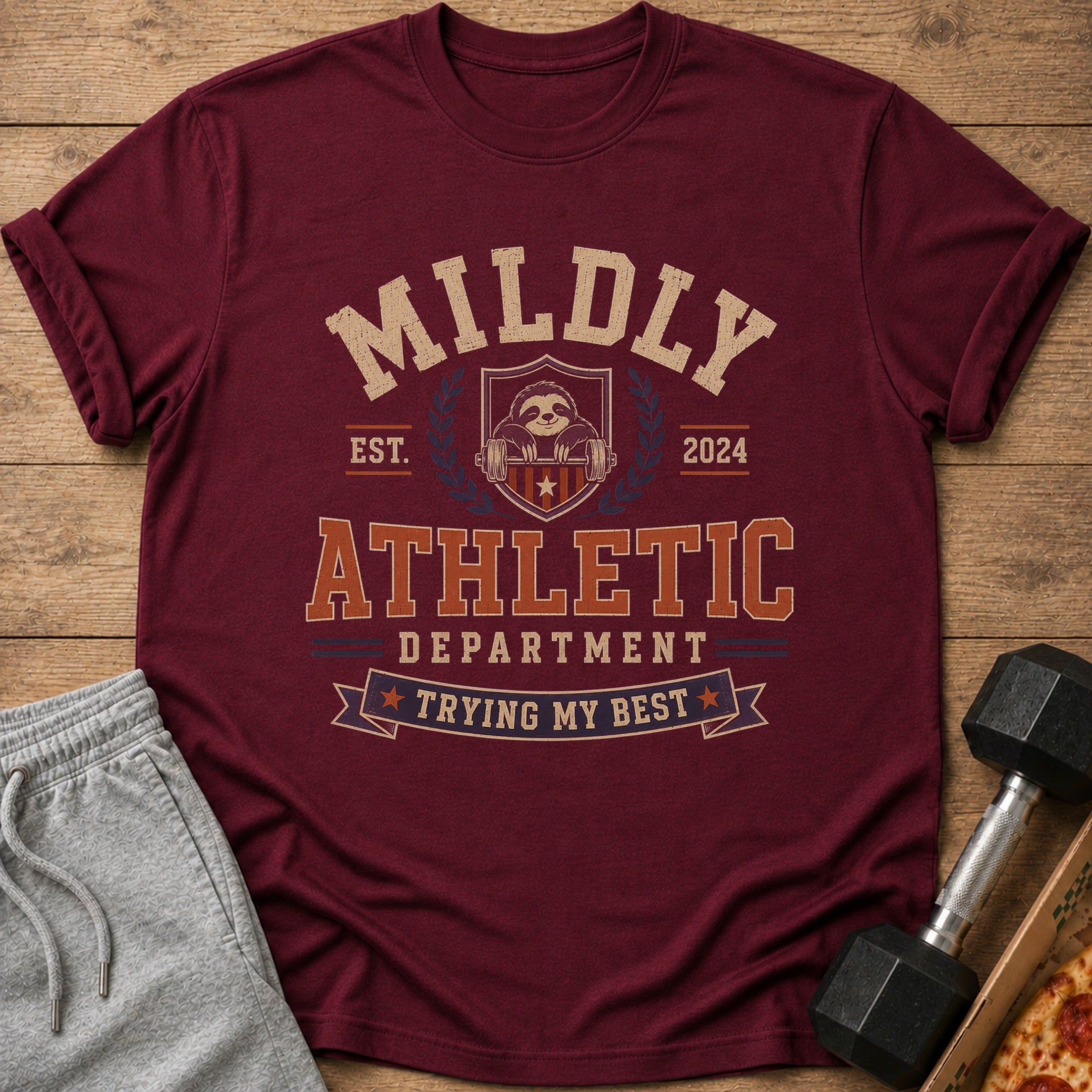 Maroon t-shirt with "Mildly Athletic Department Trying My Best" text and sloth graphic.