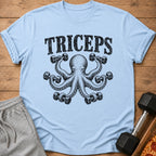 Light blue t-shirt with black graphic of an octopus lifting dumbbells and the word "TRICEPS".